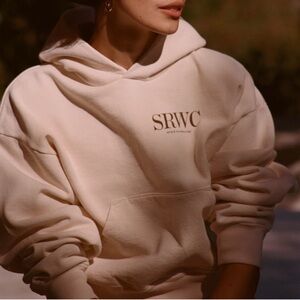 Sporty & Rich Upper East Side cropped cream hoodie
